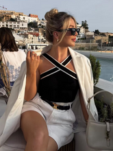 Load image into Gallery viewer, Black criss-cross neckline knit tank top with contrast white trim  minimalist capsule wardrobe essential for women.