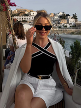 Load image into Gallery viewer, layering tank top, Black knit cami top with cross-front straps versatile layering piece for capsule wardrobe looks. criss cross neck top, black halter tank top