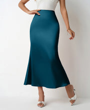 Load image into Gallery viewer, Chic satin midi skirt outfit for women with high waist bias cut fit. Lightweight slip skirt perfect for workwear looks, brunch styling, wedding guest outfits & TikTok viral satin skirt trends.