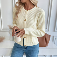 Load image into Gallery viewer, Women’s waffle knit cardigan in cream, cropped knit cardigan women trend, neutral color layering cardigan for workwear outfits, affordable cardigan under $50, wrinkle free cream sweater for office.