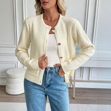 Load image into Gallery viewer, Button down cream knit cardigan women’s style, long sleeve cardigan for workwear and travel, spring layering knit cardigan, neutral sweater outfit ideas, sustainable cardigan for office chic looks.