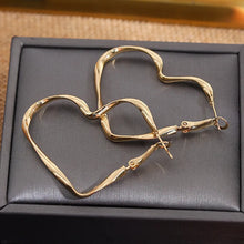 Load image into Gallery viewer,  Earrings for women, heart hoop earrings, heart earrings, dangle heart shaped earrings, womens fashion jewelry, heart drop earrings, party wear earrings, fun quirky earrings for women, Asymmetric earrings for women, Quirky earrings for women, Chic earrings for women, Statement earrings, everyday jewelry, Modern fashion earrings, Elegant jewelry for women, Fun fashion jewelry.
