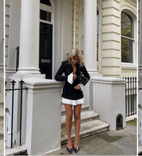 Load image into Gallery viewer, black and white mini dress, black and white blazer dress, pleated mini dress, suit coat dress, Instagram-worthy black dress with white ruffle trim, Editorial Style Dress, Luxury Mini Dress suit dress, blazer dress, pleated blazer dress, black mini dress, womens casual formal wear, suit dress for women, old money outfit,Long Sleeve Mini Dress, Deep V Neck Dress.
