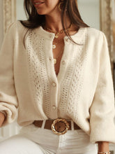 Load image into Gallery viewer, Women’s pearl-button knit cardigan sweater in cream, relaxed fit with subtle puff sleeves and ribbed hem – ideal cozy cardigan for work layering and stylish sweater top looks.