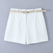 Load image into Gallery viewer, white tailored shorts, shorts with belt, belted shorts, office shorts, ladies tailored shorts, High-waisted wide-leg belted shorts for women, tailored high-waist pleated design, high-waist belted shorts, chic neutral outfit for summer travel, office wear, and effortless brunch styling.