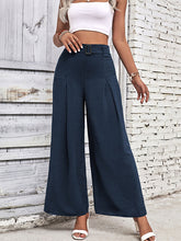 Load image into Gallery viewer, navy blue wide leg pants for women belted high waisted trousers in blue, versatile workwear wide leg pants outfit, flowy travel trousers, chic office-ready belted wide leg pants style.