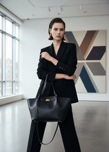 Load image into Gallery viewer, work tote for women, Women’s luxury tote bag Solenne in black with gold hardware, business tote bag women, a chic oversized work bag women love for business tote bag styling, fall business capsule outfit bag, office bag women.