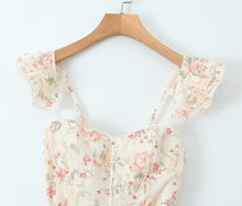Load image into Gallery viewer, floral laceup midi sundress, Floral Midi Dress, Midi Sundress, White floral Dress, Corset Dress, Midi Sling Dress, corset midi dress, long white dress, floral corset dress, Flowy midi Sundress, boho floral dress, Summer Plunging neck Dress, white floral corset dress, backless midi sundress, summer floral backless dress