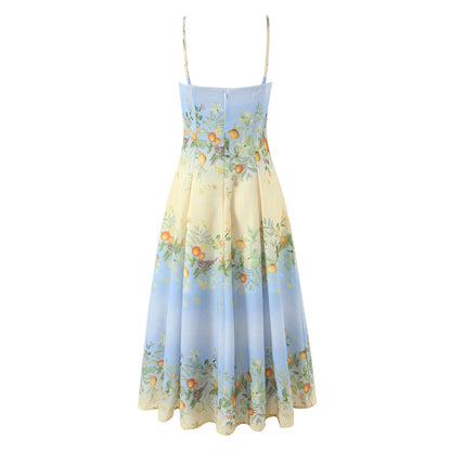 Botanical corset midi dress with a sweetheart neckline, blue-to-ivory ombré floral print, structured bodice, and flowing fit-and-flare midi skirt.
