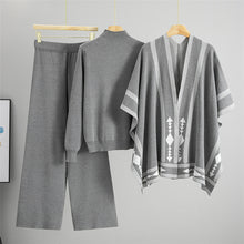 Load image into Gallery viewer, layered winter fashion, Affordable knitwear sets under $150, Instagram worthy cozy outfits, Chic knit set for women sweater, pants, poncho combo as a cozy brunch outfit or stylish travel look with geometric poncho detail, knitted ponchos, cozy knitwear outfits.