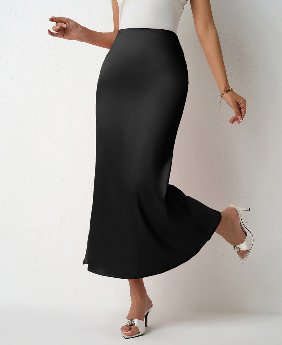 Black Chic satin midi skirt outfit for women with high waist bias cut fit. Lightweight slip skirt perfect for workwear looks, brunch styling, wedding guest outfits & TikTok viral satin skirt trends.