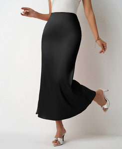 Black Chic satin midi skirt outfit for women with high waist bias cut fit. Lightweight slip skirt perfect for workwear looks, brunch styling, wedding guest outfits & TikTok viral satin skirt trends.