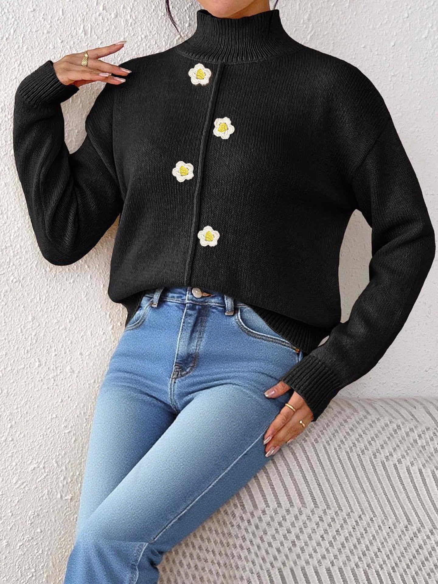 wool blend sweater, women's crew neck sweatshirt, Black high-neck knit sweater with floral buttons, warm wool-blend fall top for women, everyday winter outfit piece, minimalist capsule wardrobe sweater aesthetic.