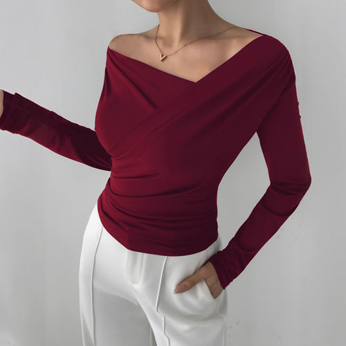 Burgundy off shoulder top for women, slim fit wrap blouse styled as elegant office wear blouse, chic desk to dinner top, and trendy fall fashion outfit for brunch or date night.