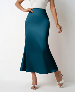 Chic satin midi skirt outfit for women with high waist bias cut fit. Lightweight slip skirt perfect for workwear looks, brunch styling, wedding guest outfits & TikTok viral satin skirt trends.