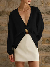 Load image into Gallery viewer, Chic women’s knit cardigan with cinched waist and statement gold button, deep V-neck design, and puff sleeves the perfect fall cardigan outfit for Pinterest-style neutral looks, quiet luxury fall knitwear, neutral outfit essential for chic layering, work, and date nights.