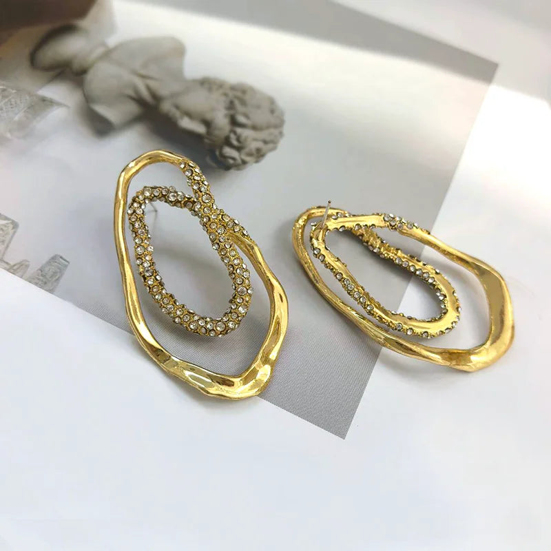Diamond drop earrings, statement earrings, Gold sculptural double-oval statement earrings for women featuring pavé crystal accents, hypoallergenic metal, lightweight drop design, elegant modern jewelry USA.