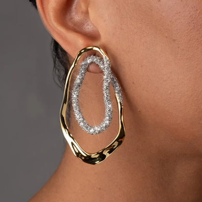 Diamond drop earrings, statement earrings, Gold sculptural double-oval statement earrings for women featuring pavé crystal accents, hypoallergenic metal, lightweight drop design, elegant modern jewelry USA.