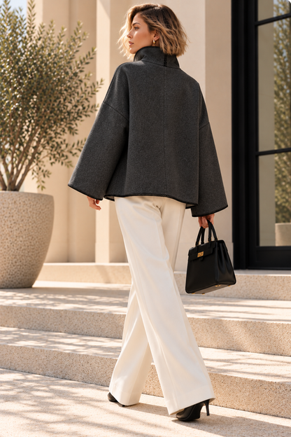 relaxed fit jacket women, oversized funnel neck jacket women, structured high collar with a straight hip-length hem, dropped shoulders and contrast blanket stitching, suited to smart casual jacket styling, weekend outfit women and contemporary fall wardrobes.