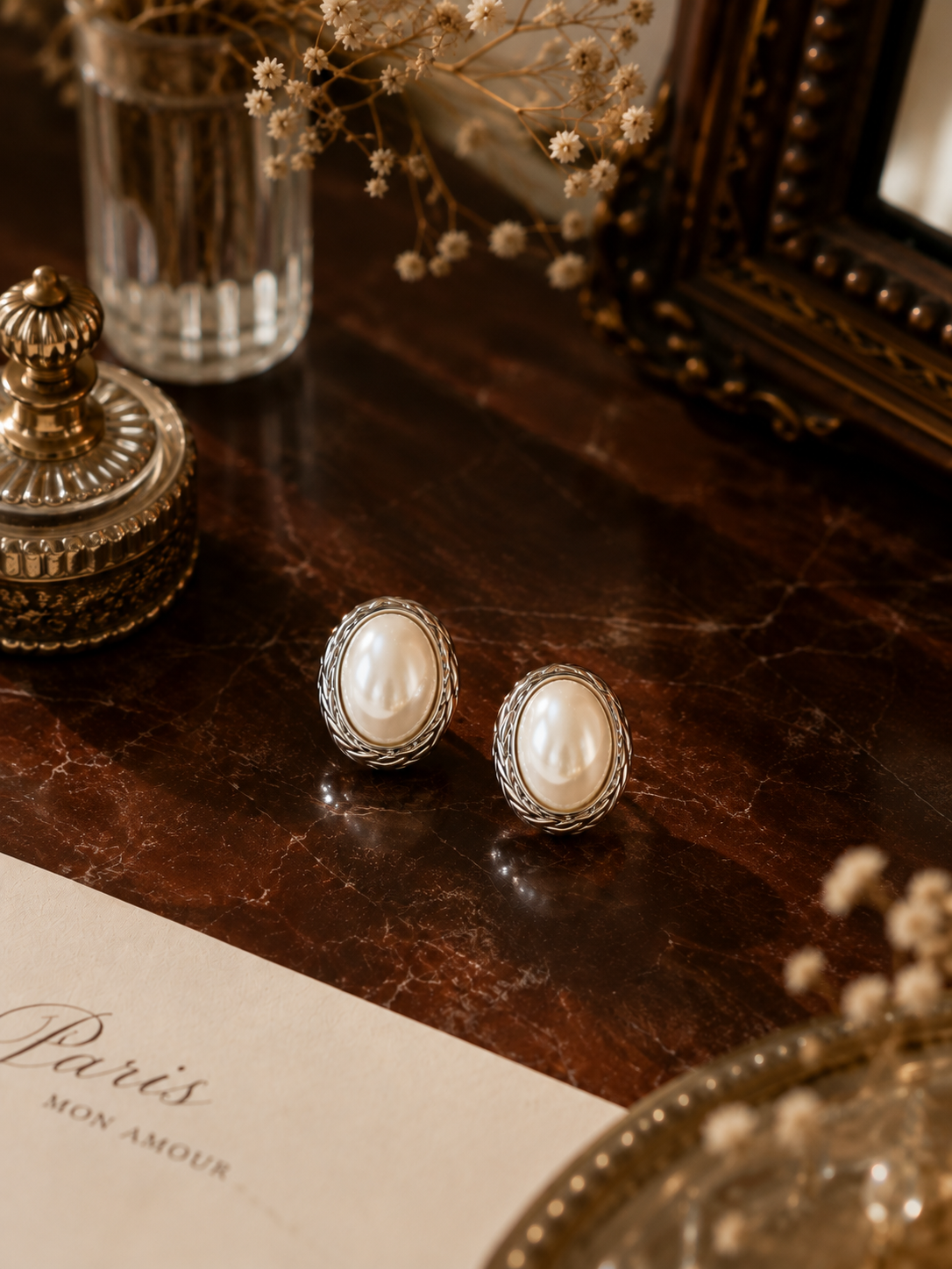 Elegant oval pearl stud earrings with simulated pearls, durable stainless steel, and a secure push-back closure, perfect for women searching for timeless minimalist fashion jewellery.
