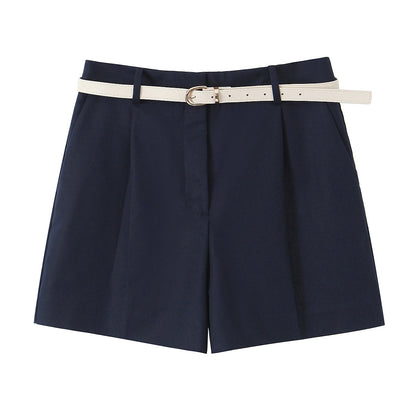 Elegant wide-leg belted shorts for women in navy blue color, tailored high-waist pleated design, lightweight summer outfit, chic office and vacation shorts, minimalist capsule essential.