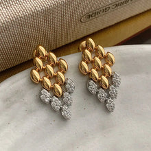 Load image into Gallery viewer, Gold geometric dangle earrings for women featuring a rhombus-shaped drop with crystal stone detailing. elegant drop earrings, chic dangle earrings for women, party earrings women, Lightweight statement earrings ideal for workwear, office outfits, party wear, weddings, and evening looks.