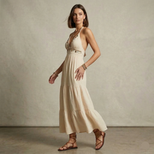 Load image into Gallery viewer, Ruffle tiered boho maxi, Tiered smocked waist maxi, Halter maxi dress with open back design and smocked waistband, beige bohemian halter maxi dress featuring tiered skirt silhouette and lightweight viscose fabric for summer evening halter maxi wear, tiered maxi petite frame, tiered maxi petite frame,  Instagram bohemian maxi dress.