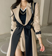 Load image into Gallery viewer, womens two toned trench coat, womens wrap winter coat, womens winter swing coats, long trench coat, belted trench coat, long winter parka womens, stylish coats for women, dressy winter coat, women&#39;s winter coats &amp; jackets, womens belted winter coat, womens trench coat, coats and jackets, long parka coat for women, women&#39;s dual toned trench coat, camel coat, black trench coat
