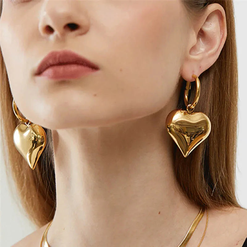 Heart Dangle Earrings, Drop Heart Earrings, Earrings for women, Drop Earrings, heart earrings, dangle heart shaped earrings, womens fashion jewelry, heart drop earrings, Asymmetric earrings for women, Quirky earrings for women, Chic earrings for women, Statement earrings.