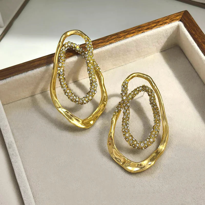gold hoops, diamond stud earrings, Hypoallergenic pavé crystal oval earrings for women, statement jewelry in gold or silver tones, lightweight sculptural design, modern USA fashion accessory.