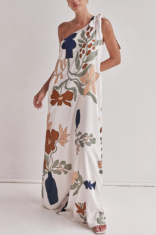 floral maxi dress, one shoulder maxi dress, boho maxi dress, flowy maxi dress, long dresses, tie shoulder maxi dress, printed summer dress, Earthy print one-shoulder beach dress, Casual flowy summer dress for vacation,  Trendy one-shoulder dress, Effortless elegance dress.
