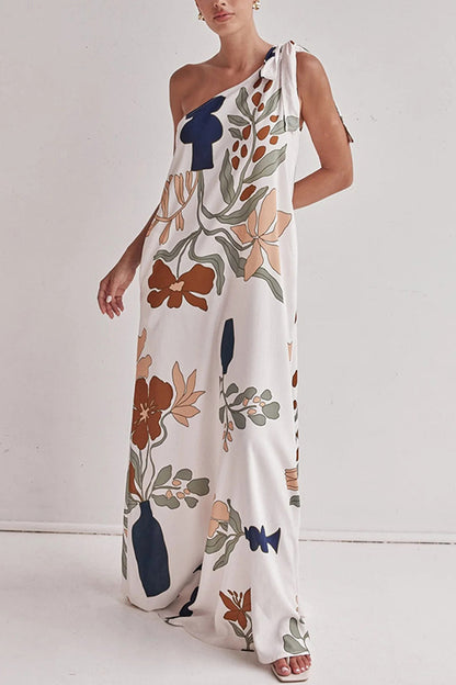 floral maxi dress, one shoulder maxi dress, boho maxi dress, flowy maxi dress, long dresses, tie shoulder maxi dress, printed summer dress, Earthy print one-shoulder beach dress, Casual flowy summer dress for vacation,  Trendy one-shoulder dress, Effortless elegance dress.