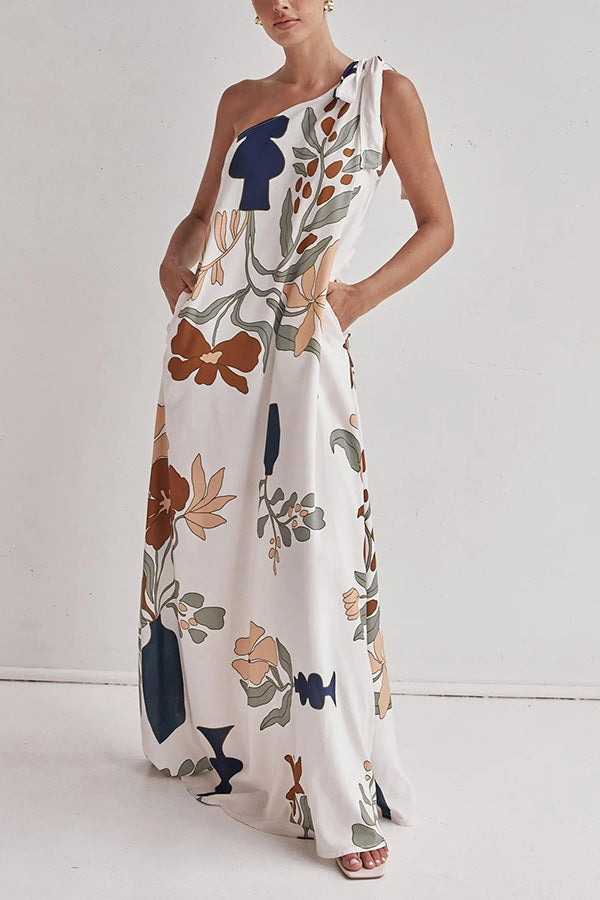 floral maxi dress, one shoulder maxi dress, boho maxi dress, flowy maxi dress, long dresses, tie shoulder maxi dress, printed summer dress, Earthy print one-shoulder beach dress, Casual flowy summer dress for vacation,  Trendy one-shoulder dress, Effortless elegance dress.