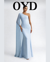 Load image into Gallery viewer, Asymmetrical evening dress, One shoulder evening gown with pleated cape sleeve, bodycon silhouette and maxi length formal design, ideal for evening party dresses and wedding guest dresses with sculpted elegant finish, pleated cape gown, blue evening gown.