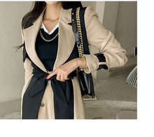 Load image into Gallery viewer, women&#39;s trench coat two toned, women&#39;s winter coats &amp; jackets, womens belted winter coat, womens trench coat, coats and jackets, long parka coat for women, women&#39;s dual toned trench coat, camel coat, black trench coat, formal trench coat, black trench coat women, fall aesthtic coat, winter womens trench coat, fall season trench coat.