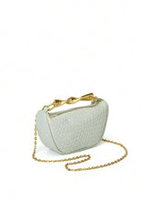 Load image into Gallery viewer, Statement handle bag, woven straw bucket bag, stylish bag for wedding guest, eco-conscious vacation purse, summer straw tote, Pinterest-worthy accessory, Sculptural handle &amp; statement bags