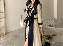 Load image into Gallery viewer, womens two toned trench coat, womens wrap winter coat, womens winter swing coats, long trench coat, belted trench coat, long winter parka womens, stylish coats for women, dressy winter coat, women&#39;s winter coats &amp; jackets, womens belted winter coat, womens trench coat, coats and jackets, long parka coat for women, black trench coat, fall aesthetic womens trench coat.