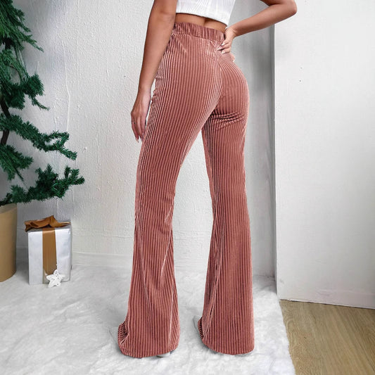 Soft ribbed corduroy pants for women, chic travel pants with 70s style flare hem, elegant flared winter pants, versatile office-ready trousers, and Instagram trending flare pants aesthetic.