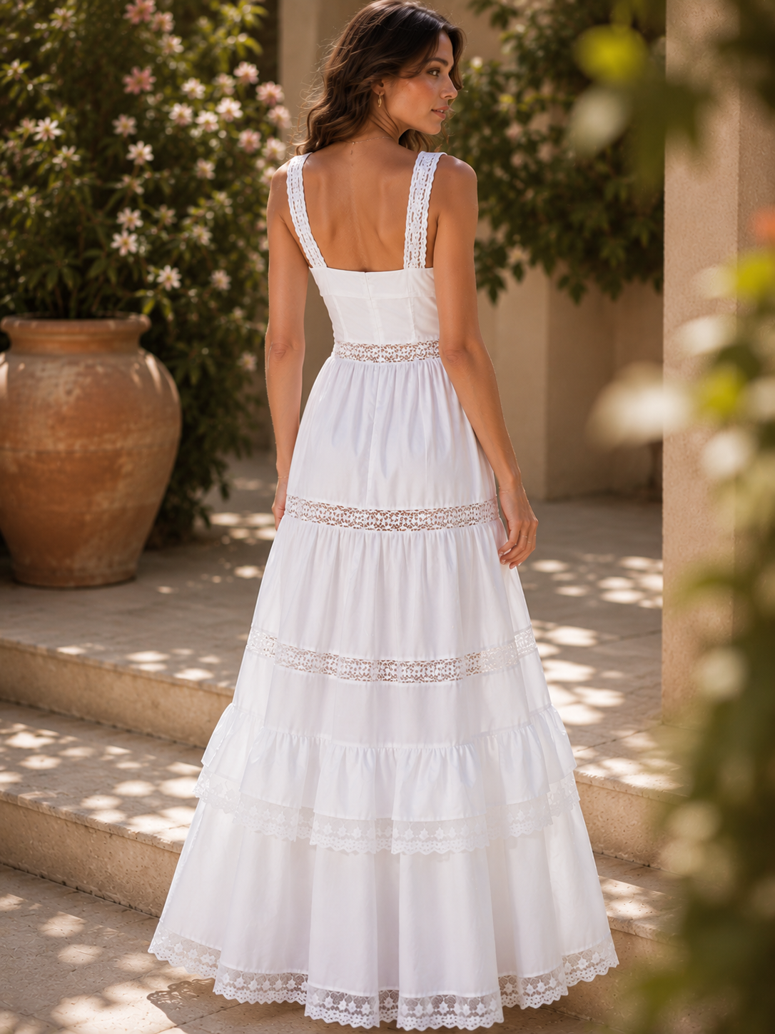 Square neck maxi dress with a fitted corset-inspired bodice, lace waist detailing, tiered skirt, and fabric-covered button placket, styled as a garden party dress for bridal brunches, outdoor weddings, and sophisticated summer events.