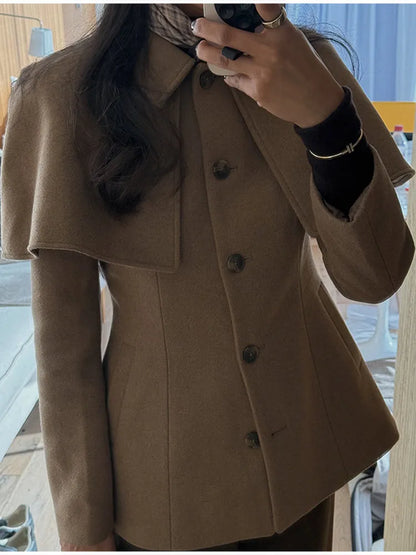 Structured cape blazer women in a timeless tailored cut, business casual jacket with cape collar detail, refined old money jacket look, perfect for office wear and classy fall outfits women.