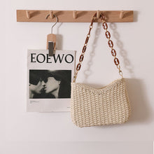 Load image into Gallery viewer, vacation beach bag, woven straw beach bag women, Structured straw shoulder bag with braided raffia texture and resin chain handle, elegant straw weave handbag ideal as a vacation straw bag for travel, beach days, and summer outfits, boho casual straw tote, boho straw bag summer, woven beach bag vacation.