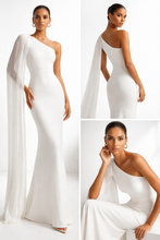 Load image into Gallery viewer, Asymmetrical evening dress, One shoulder evening gown with pleated cape sleeve, bodycon silhouette and maxi length formal design, ideal for evening party dresses and wedding guest dresses with sculpted elegant finish, pleated cape gown, white evening gown.