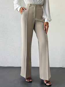 Women’s column wide-leg trousers with center crease, high waist neutral beige tailored office pants, business casual wardrobe essential.