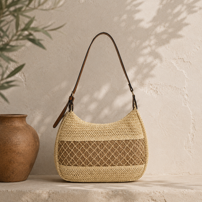 Women's straw shoulder bag with braided raffia texture and slouchy hobo profile, woven bag designed as a boho straw shoulder bag women style for casual summer purse outfits and vacations.