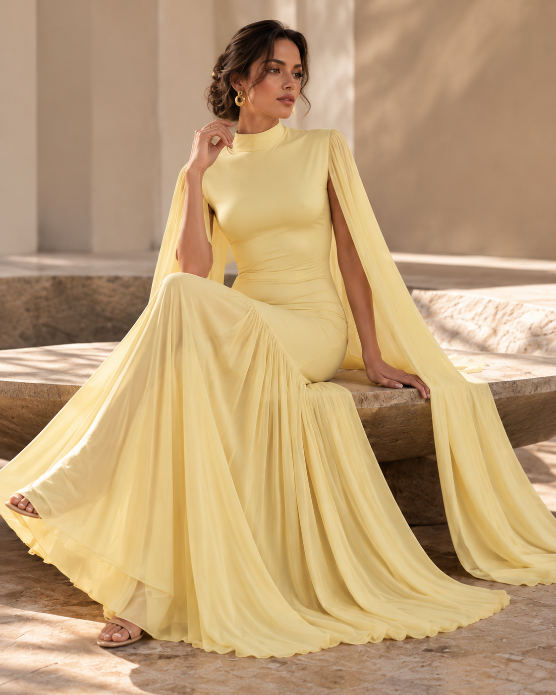 cape sleeve dress with asymmetrical pleated drape, Yellow formal wedding guest gown for women featuring long cape sleeves, fitted bodice, high neckline and flowing pleated maxi skirt, combining elegant coverage and dramatic movement for evening receptions.