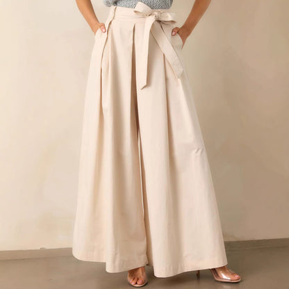 belted wide leg pants, high waisted wide leg pants, Cream wide leg pants women, smooth structured fabric with high waisted belted design, flowy full length silhouette, cream wide leg pants outfit women, perfect for business casual wear, business casual pants women.
