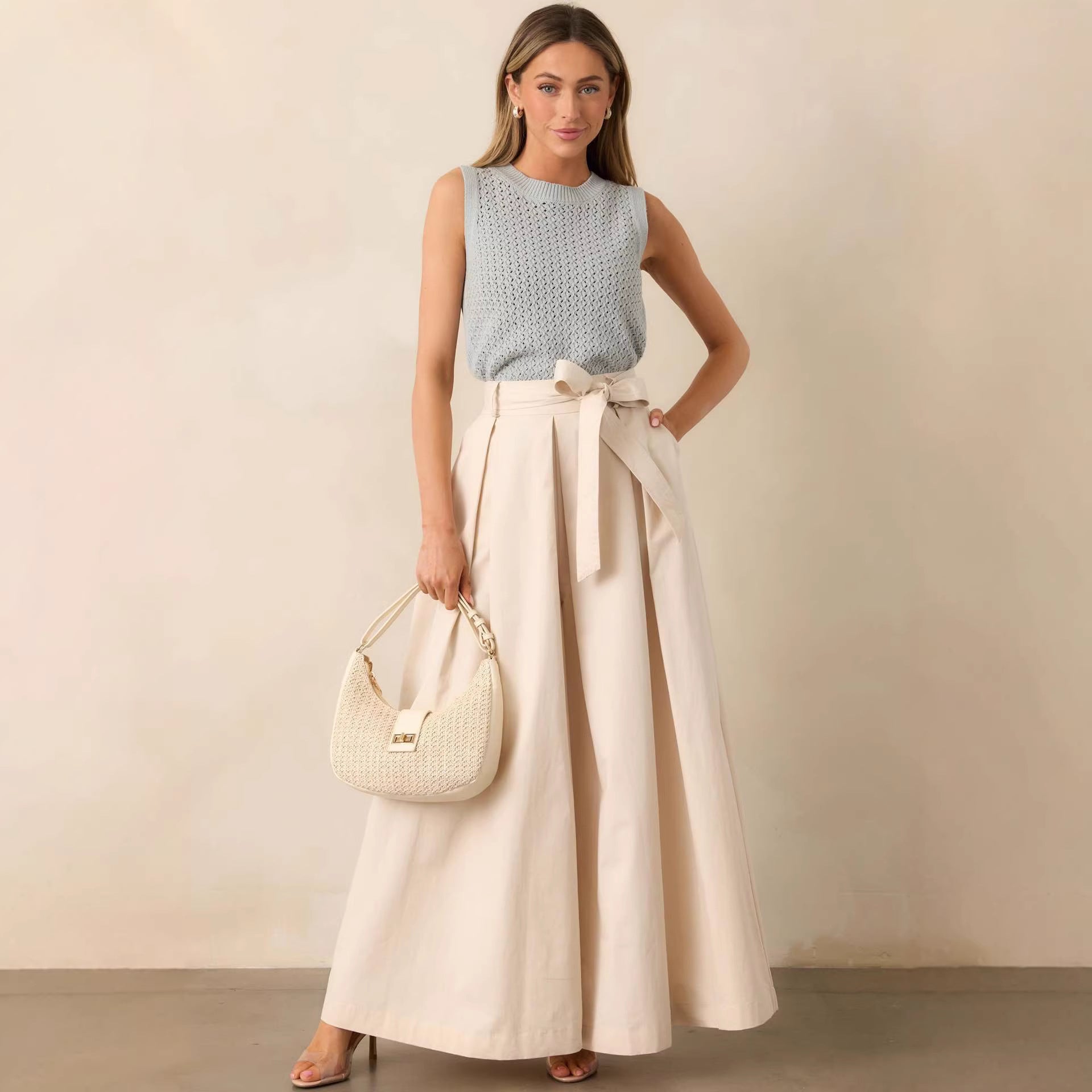 high waisted cream belted wide leg pants, high waisted wide leg pants work outfit, belted wide leg trousers women outfit, casual chic outfit women, Belted wide leg pants women, lightweight structured fabric with adjustable tie waist and side pockets, full length flowy silhouette, cream trousers outfit business casual women, perfect for work outfits.