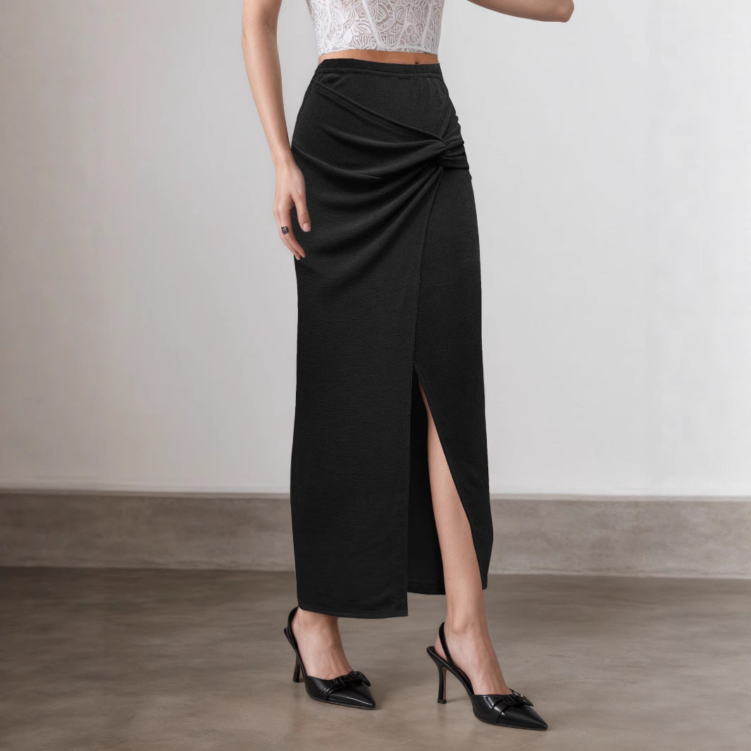 Black and taupe ruched maxi skirt, high slit knot-front style, chic women’s evening skirt for travel, parties, and minimalist wardrobes.