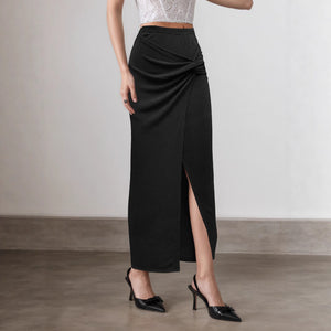 Black and taupe ruched maxi skirt, high slit knot-front style, chic women’s evening skirt for travel, parties, and minimalist wardrobes.