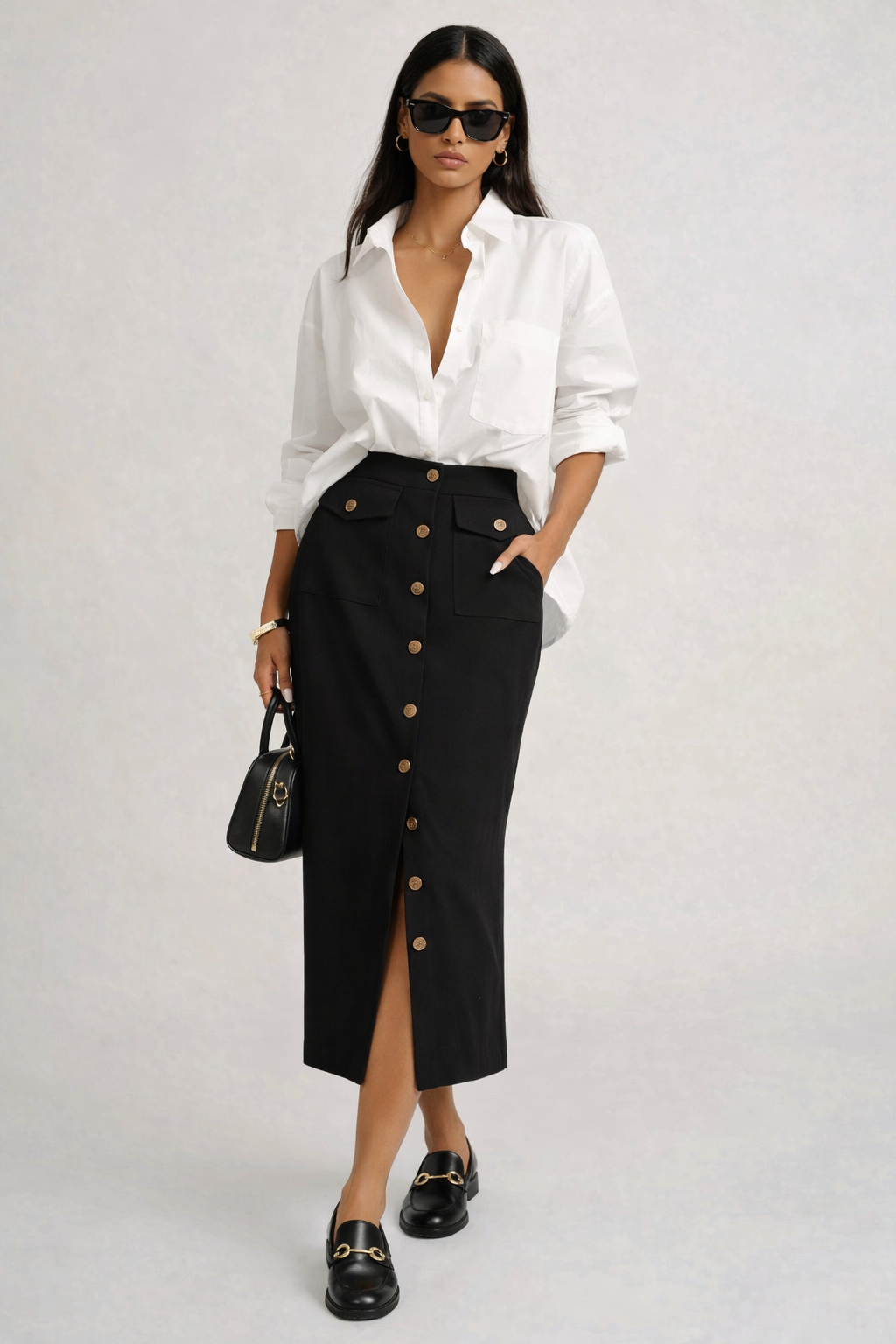 black midi skirt office outfit women, high waisted black midi skirt with buttons, button front midi skirt work outfit, black midi skirt with slit outfit, business casual midi skirt outfit women,  black pencil midi skirt outfit ideas, minimalist black midi skirt outfit,black midi skirt outfit for work.